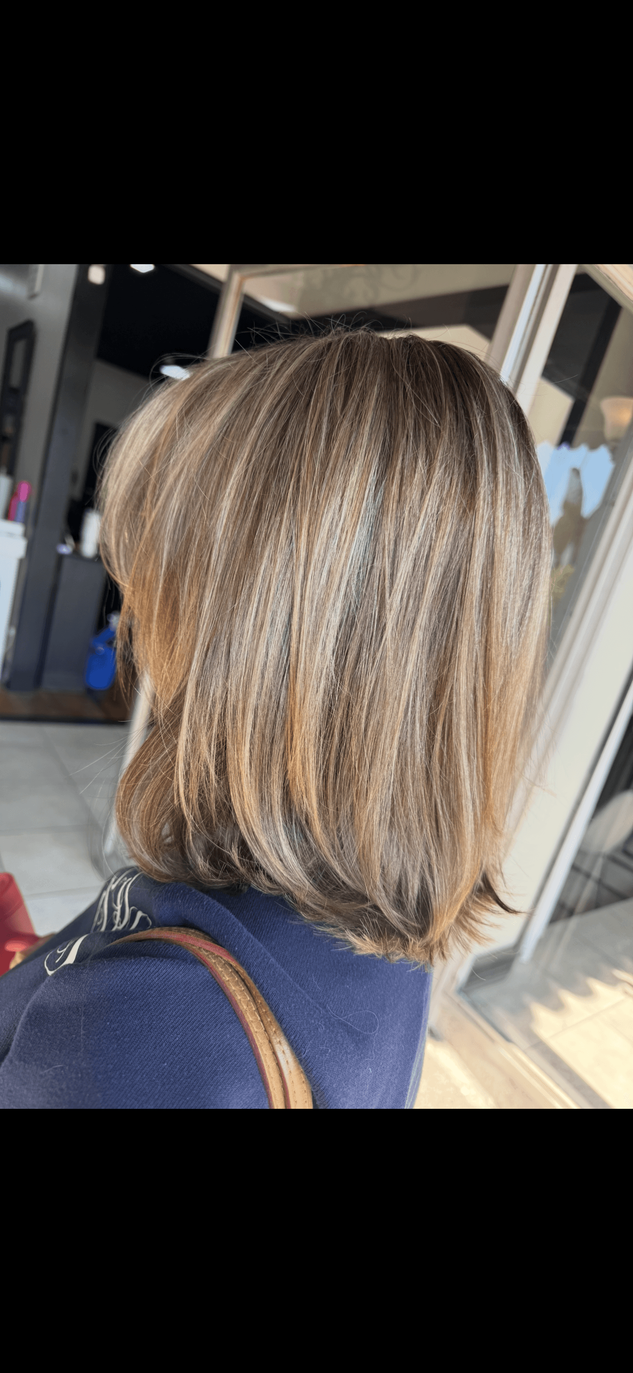 Blonde balayage lob cut by Brooke Holland