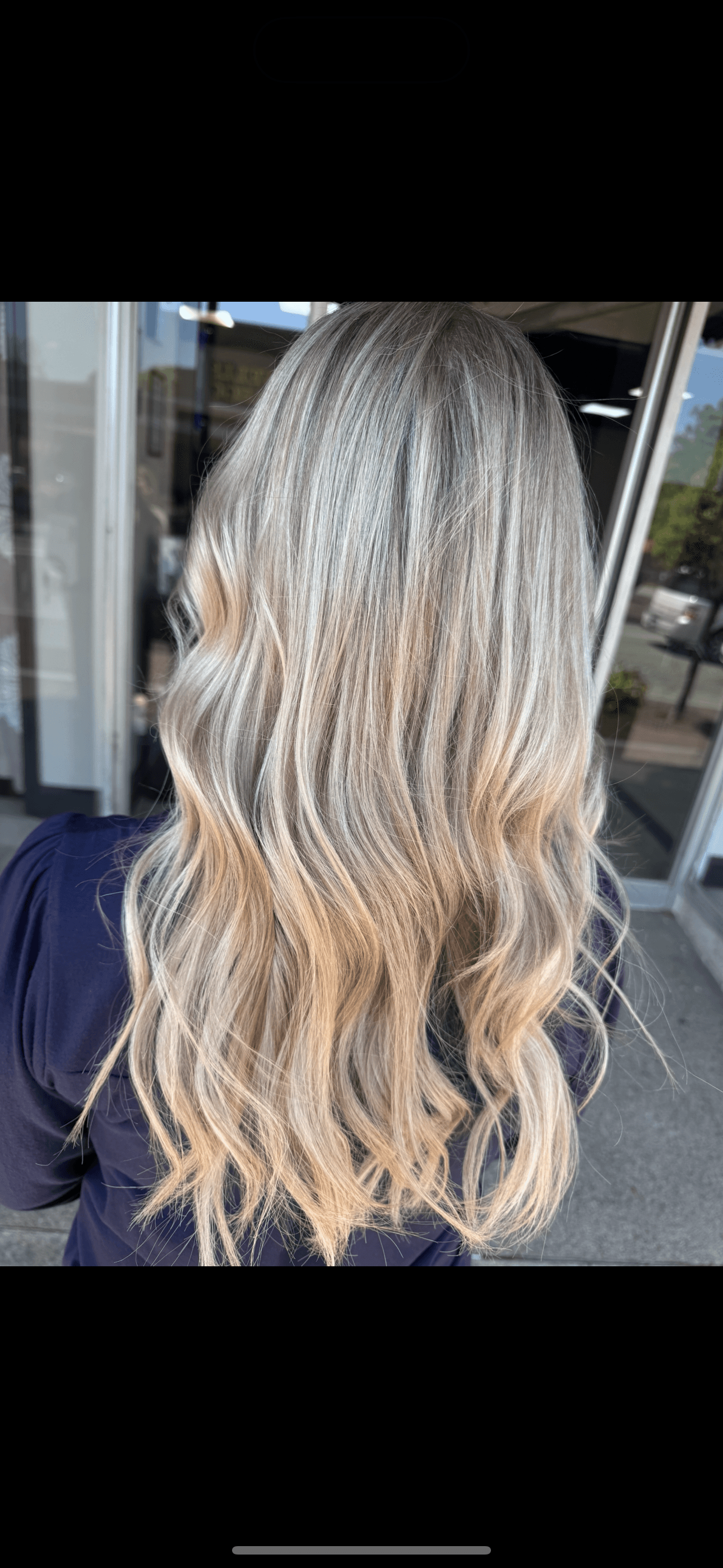 Butter blonde balayage with beach waves by Brooke Holland